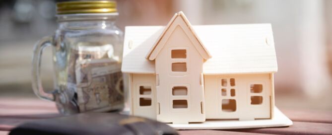 miniature house with savings jar wallet 23 2148081091