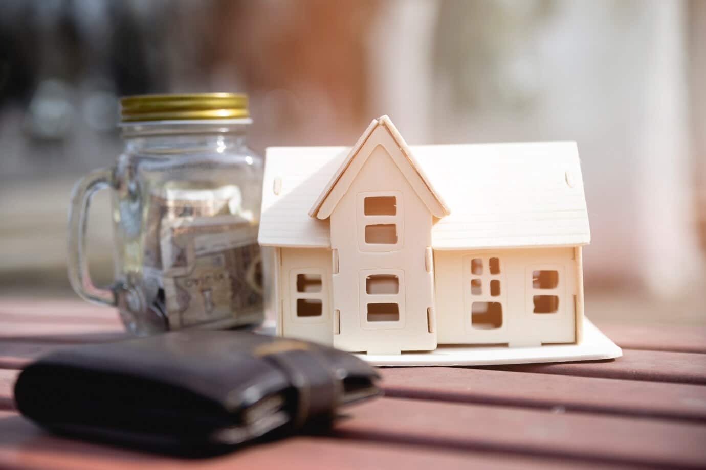 miniature house with savings jar wallet 23 2148081091
