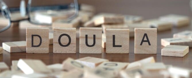 Blocks that spell the word doula