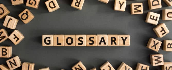 Scrabble tiles spelling the word glossary