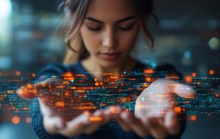 Woman holding representation of digital technology